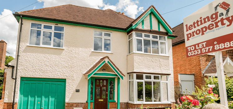 to-let board in front of a house